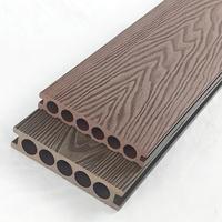 Revêtement de terrasse composite co-extrudé WPC OEM, résistant à l'eau, à grain de bois creux, pose facile par clipsage, pour extérieur