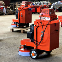 Machine professionnelle de ponçage de sols en béton et terrazzo avec moteur électrique pour la finition des surfaces en pierre