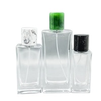 Bouteille de parfum vide transparente Rectangle portable vide 30 ml 50 ml 100 ml 3.4oz Bouteilles d'atomiseur de parfum en verre avec couvercles personnalisés
