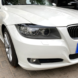 Pegatinas para Cejas de Faros Delanteros BMW Serie 3 E90 E91, Textura de Fibra de Carbono, Color Negro Piano, Adhesivos para Carrocería 2005-2012 - Product Image 1