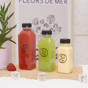 Bouteille de jus en PET transparente jetable de 250 ml, 350 ml, 500 ml avec bouchon à vis et impression sérigraphique pour eau minérale, thé, soda, boissons énergisantes - Product Image 1