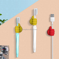 Vente chaude Creative Silicone Pouce Multi-Fonction Adhésif Clé Fil Crochet Câble De Charge Crochet Clip Pouce Crochets Câble Organisateur