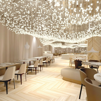 Lustre en verre exclusif ANNO pour plafond de restaurant de luxe