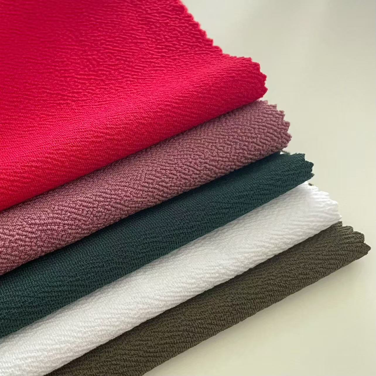 ANONO High Quality Hot Selling Polyester Spandex Ant Crepe Dyed Knitted Fabrics Sportswear Elastic Textile Fabric for Dresses