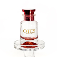 Boîte de parfum ronde au design unique Pot cosmétique en verre Bouteilles de pulvérisation en verre Bouteille d'huile essentielle Bouteille de parfum de 100ml