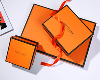 Boîte d'emballage de luxe avec logo personnalisé pour foulards en soie boîte d'emballage cadeau en carton pour vêtement vêtement