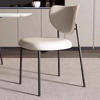 Chaise de salle à manger minimaliste italienne en acier avec revêtement en cuir, design nordique moderne, dossier vintage pour la maison, l'hôtel et le café