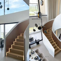 Design créatif moderne Escalier en colimaçon en acier courbé personnalisé en usine pour villas et hôtels