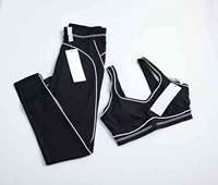 Ensemble de yoga côtelé sans couture 2 pièces : Leggings taille haute et crop top pour l'entraînement, tenue de sport personnalisable avec logo