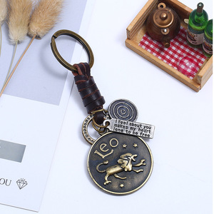 Porte-clés vintage 12 signes <span class=keywords><strong>du</strong></span> zodiaque, pendentif constellation en bronze avec anneau en cuir tressé pour hommes et femmes - Product Image 4