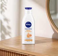 Crème pour le corps Nivea, lotion extra blanchissante, hydratante et réparatrice de nuit, protection blanchissante, vitamine E et C, pour femmes adultes, tous types de peau