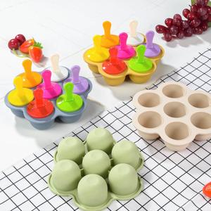 Molde de silicona de 7 cavidades para cubitos de hielo de 2 oz, apto para alimentos, sin BPA, con tapa a prueba de fugas y palo para alimentación de bebés con frutas o chupete. - Product Image 1