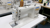 Machine à coudre industrielle à point noué à grande vitesse avec table et servomoteur JUKI DLN-9010A-SH