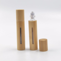 Flacons roll-on en verre de 10 ml avec bouchon en bambou et billes en acier inoxydable, étanches, portables pour le stockage d'huiles essentielles et de parfums.