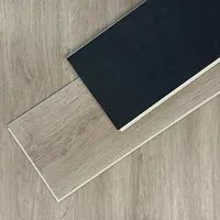 Revêtement de sol SPC ignifuge de qualité supérieure pour intérieur, revêtement de sol SPC moderne imperméable, revêtement de sol SPC en plastique