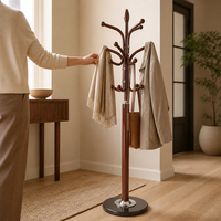 Porte-manteau sur pied de style européen, luxe léger, en fer poli miroir, mobile, pour chambre à coucher moderne