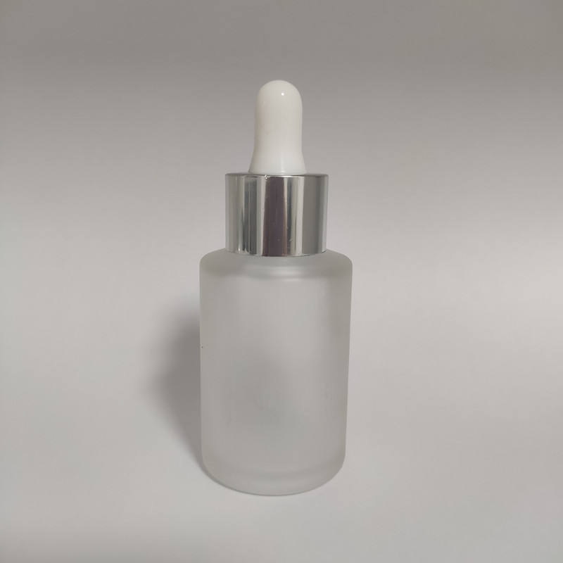 frosted bottle with silver dropper head