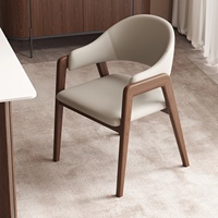 Italienischer Minimalistischer Massivholz-Esszimmerstuhl Nordisches Design für Zuhause, Hotel, Restaurant Freizeit-Armlehnstuhl Designer-Lederpolsterung
