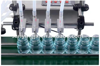 Convoyeur quantitatif automatique de bureau Machine de remplissage de bouteille en verre à quatre têtes pour eau liquide boisson