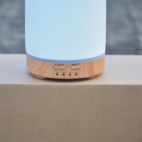Meilleure vente bon prix Diffuseur d'arômes électronique à ultrasons en céramique à grain de bois avec pierre de parfum et veilleuse à DEL de 7 couleurs