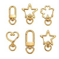 Vente en gros de fermoirs en acier inoxydable plaqués or 18 carats en forme de cœur, d'étoile et de fleur pour la fabrication de bijoux