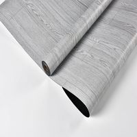 Günstiger Preis 0,7mm Holzplanken-Steinteppich Wasserdichter Kratzfester Vinyl-Bodenbelag auf Rolle für Wohnungseinrichtung
