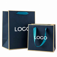 Customized Clothing Brand Packaging Paper Bag 250g Paperboard Colours Paper Bag with Ribbon Handles