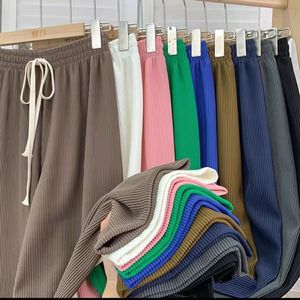 <span class=keywords><strong>Pantalon</strong></span> d'été à jambes larges <span class=keywords><strong>Pantalon</strong></span> décontracté à taille haute <span class=keywords><strong>Pantalon</strong></span> long Streetwear Femme <span class=keywords><strong>Pantalon</strong></span> cargo en polyester de couleur unie plissé Image - Product Image 2
