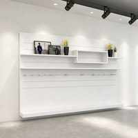 Étagères murales flottantes blanches, rail de présentation de vêtements, barre de suspension chromée, fournisseur pour la vente au détail
