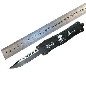 Cuchillo Táctico EDC de 9 Pulgadas con Doble Acción y Deslizador de Pulgar, Acero Inoxidable, Mango de Aleación de Zinc con Diseño de Calavera, Venta al por Mayor para Pedidos Pequeños OEM - Product Image 5