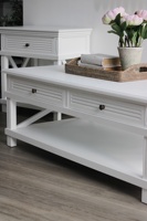 Table basse en bois massif de luxe au design moderne avec 2 tiroirs et pieds croisés, style côtier moderne