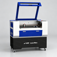 Équipement de gravure laser CO2 premium à rail intégré LM-9060-XH pour décoration non métallique et fabrication de signalétique, avec table motorisée à levage et abaissement