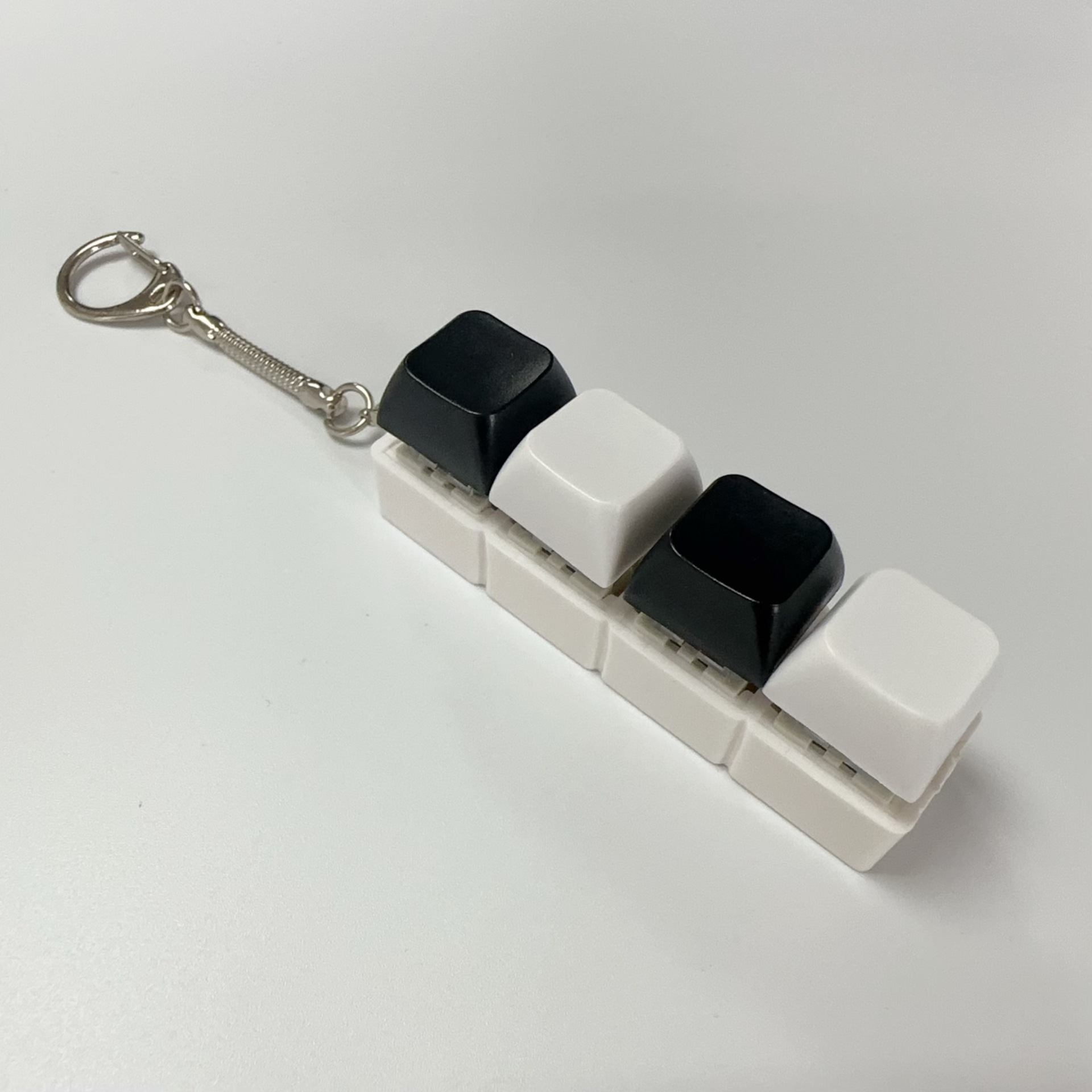 Four key white shell-black and white