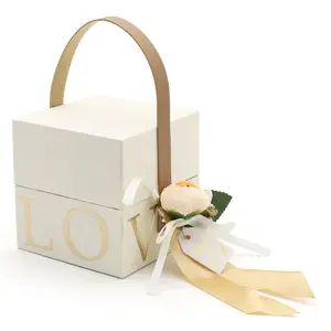 Caja de regalo de cartón rectangular pequeña de alta calidad Nuevo diseño con asa para embalaje de dulces de boda elegante