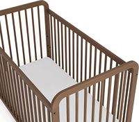 Lit bébé convertible, transformable en lit d'enfant et en lit superposé, avec 4 hauteurs de matelas réglables.