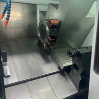 Tour CNC à banc incliné certifié CE TCK56 - Machine de tournage de haute précision à grande vitesse GSK personnalisable et économique pour usage industriel