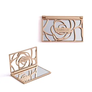 Produit populaire Conception unique Creux Or Logo personnalisé Miroir décoratif compact en métal