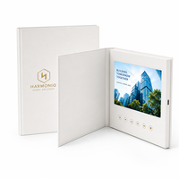 Porte-documents vidéo à couverture rigide blanche avec écran intégré pour le marketing immobilier et les présentations d'entreprise