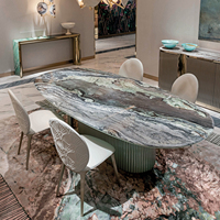 Table à manger moderne de luxe italienne avec plateau en marbre naturel ovale et piétement cannelé pour villa et maison