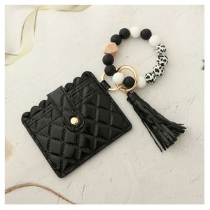 Wholesale <b>Men</b> Women Elastic Silicone <b>Bead</b> Bangle <b>Bracelet</b> Wallet Keychain Leather Tassel Wristlet Keychain Wallet - Product Image 4