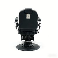 Fauteuil de Barbier Rétro Noir avec Finition Dorée, Hydraulique, Inclinable, en Cuir, Appuie-tête et Repose-pieds Ajustables, Vente en Gros pour Salons de Coiffure
