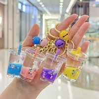 YIWUPOWER Porte-clés Licorne Mignonne Tasse de Thé au Lait à Paillettes Liquides, Ornement de Sac Arc-en-ciel, Petit Cadeau pour Machine à Attraper les Jouets