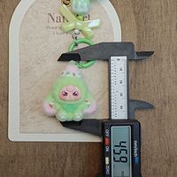 Accessoires de dessin animé 3D floqués en gros, porte-clés, pendentifs de sac, jouets tendance, accessoires DIY floqués pour breloques de sac, breloques de sac perlées