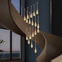 Lustre en cristal à hauteur réglable avec finition dorée LED à intensité variable pour salon