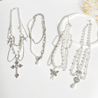 Collier pour femme de style européen et américain, en alliage, avec chaîne en bambou, fausses perles, pompon, cœur, croix, papillon, assorti à tout