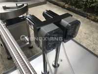 Machine de remplissage et de bouchage automatique pour flacons compte-gouttes d'huiles essentielles, machine de remplissage et de bouchage monobloc pour sérums de soin de la peau