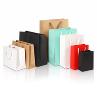 2024 vente en gros sacs fourre-tout de luxe imprimés personnalisés sacs en papier personnalisés avec logo sacs-cadeaux