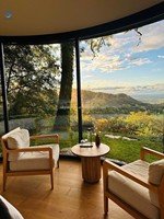 Maison conteneur ronde de style européen Villa ou appartement vert d'inspiration japonaise avec cadre en acier et matériau conteneur