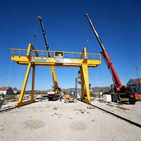 Grue portique industrielle sur pneus de 30 tonnes avec moteur et télécommande sans fil haute performance pour la construction de poutres de pont