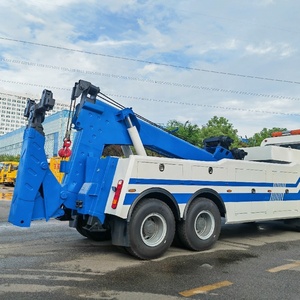 Camion de <span class=keywords><strong>remorquage</strong></span> <span class=keywords><strong>et</strong></span> de dépannage intégré HOWO 12 roues 8x4, capacité de <span class=keywords><strong>remorquage</strong></span> élevée de 25 tonnes - Product Image 1
